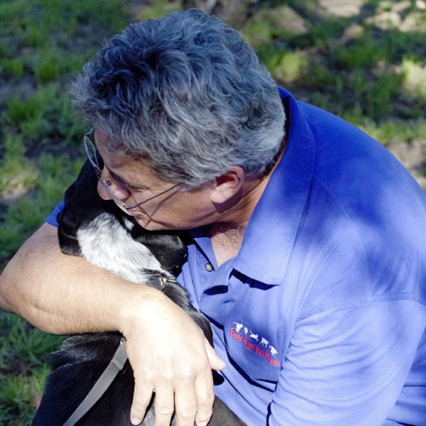 Four Paws Pet Ranch Owner and Dog